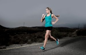 Woman running on pavement