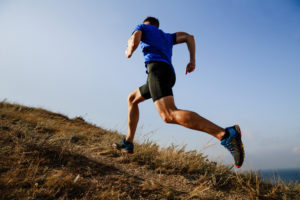 Man running up a hill